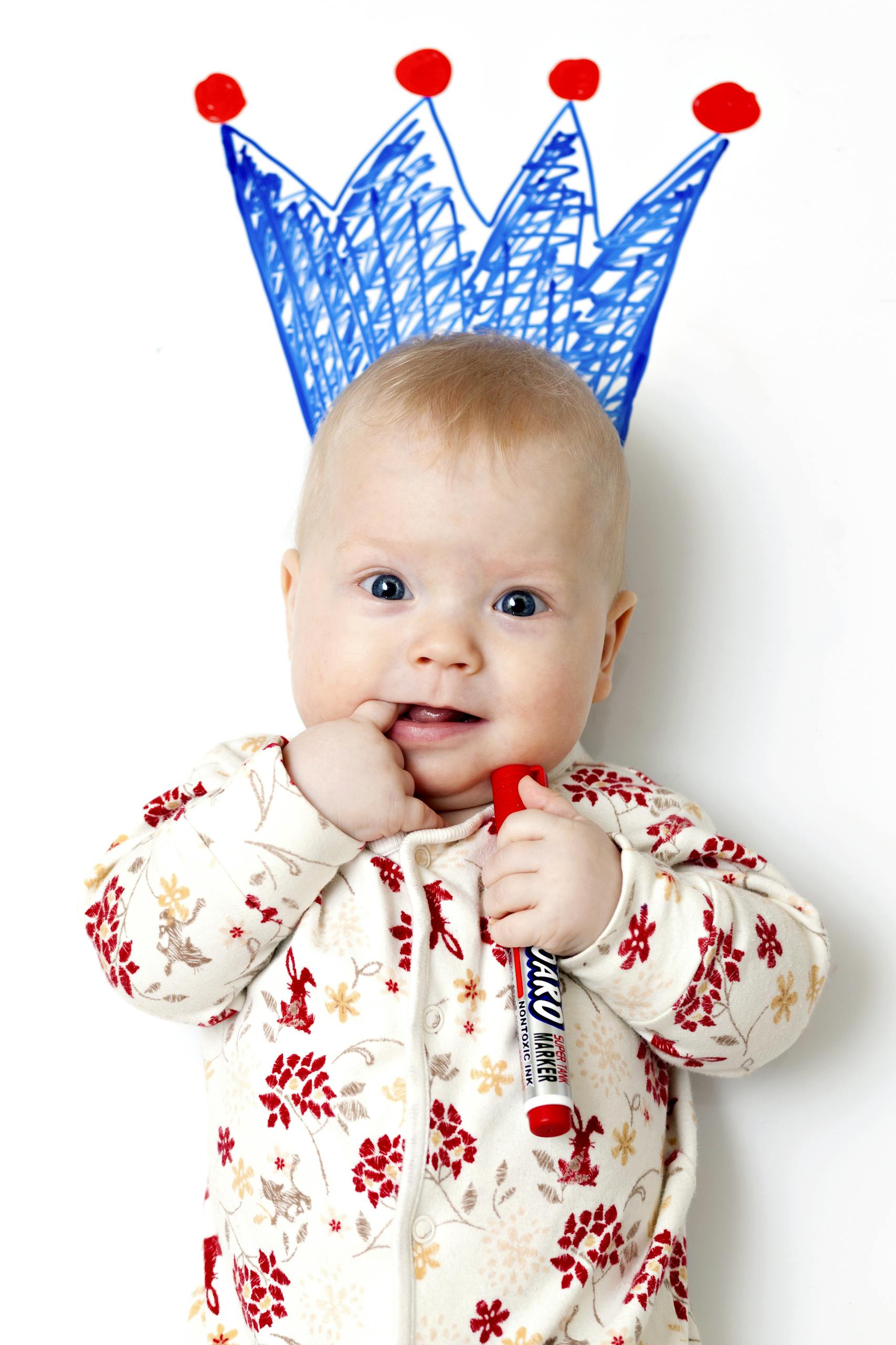 Baby in White and Red Floral Pajama